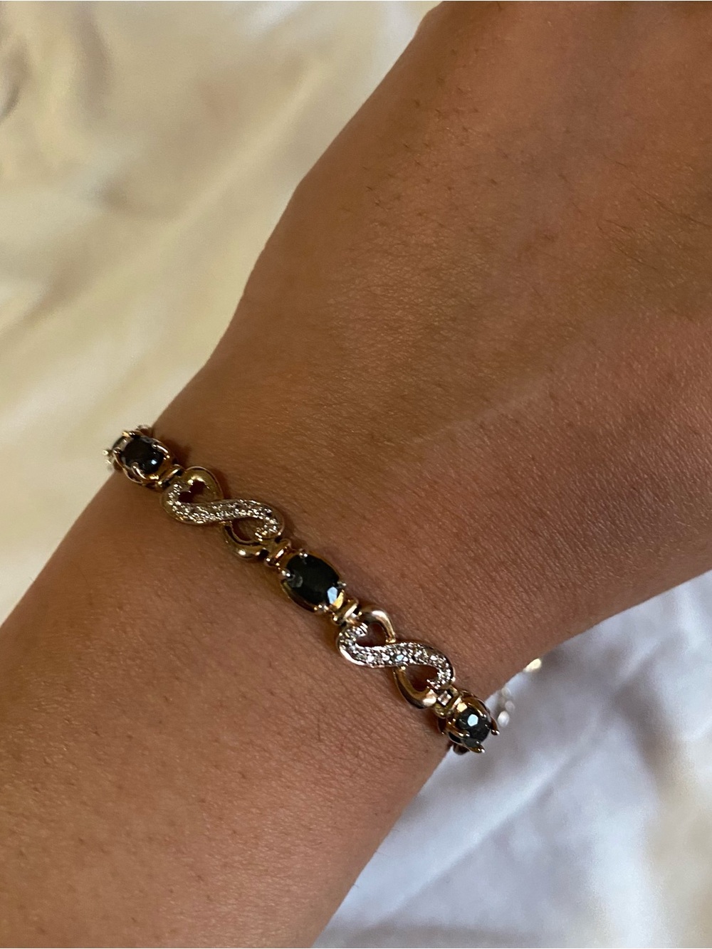 Gold Bracelet with Black Stones and Crystal Accents